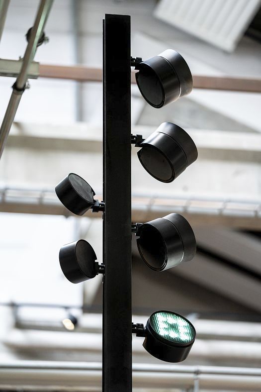 ERCO Parscan LED spotlights accent glass art at Holmegaard Værk museum.