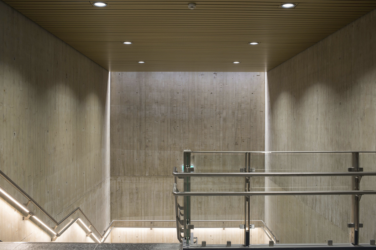 ERCO downlights illuminate the stairwell at Holmestrand Station, Vestfold, ensuring reliable 24/7 operation.