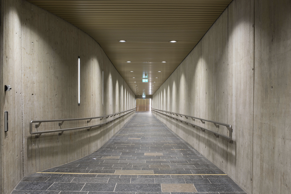 Holmestrand Station tunnel in Vestfold, Norway, illuminated by long-life ERCO LED downlights for 24/7 operation.