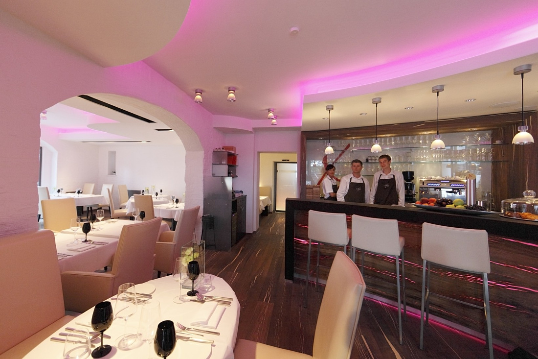 Hotel Nixe restaurant featuring Starpoint downlights and Optec spotlights for ambient lighting.