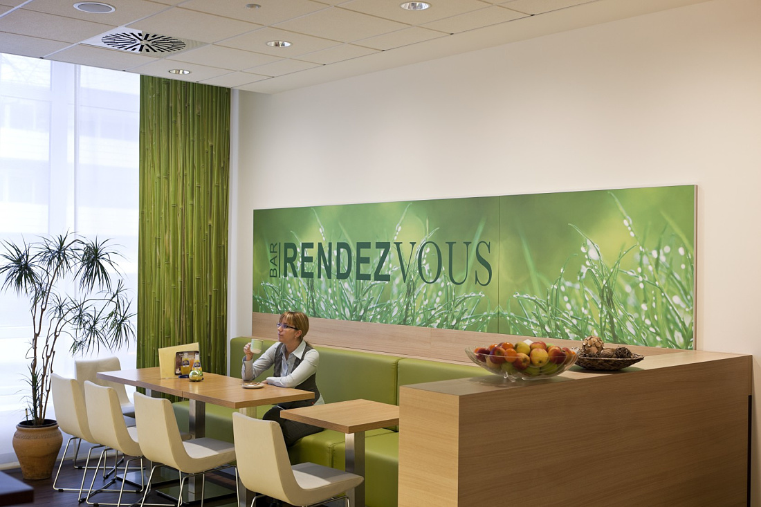 Ibis Hotel Aachen foyer featuring LED wall washers for a comfortable ambiance.