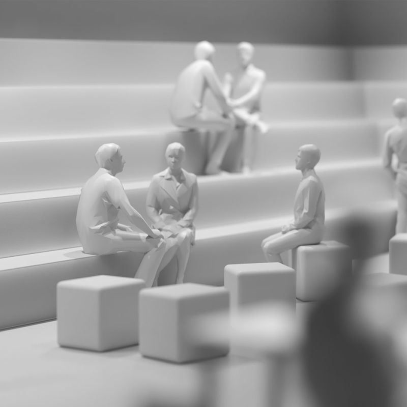 Model of people on steps and cubes, lit by Iku surface-mounted luminaires for architectural lighting.