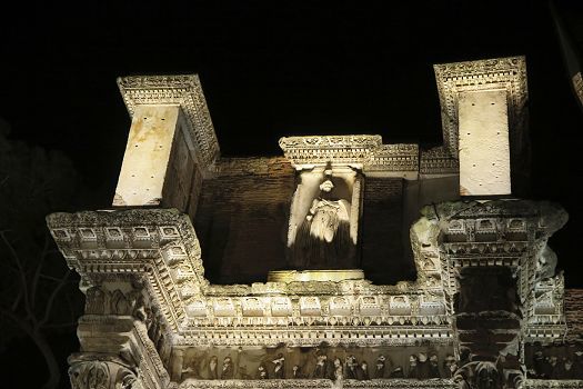Illuminated Trajans Forum in Rome featuring ERCO LED lighting highlighting historical details.