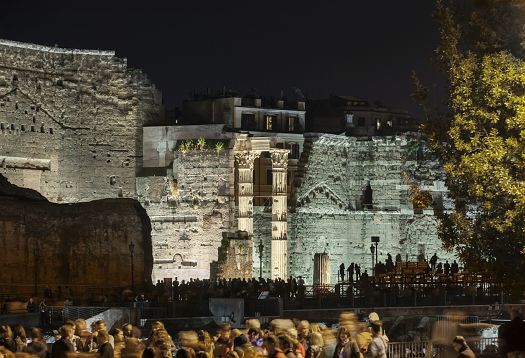 Illuminated ruins of the Imperial Forums in Rome, featuring ERCO lighting highlighting historical details.