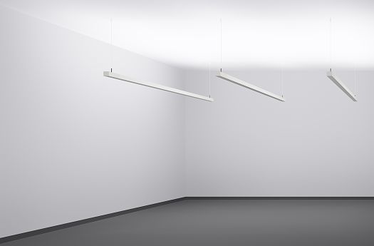 ERCO lighting structures providing indirect, diffuse light in a minimalist room.