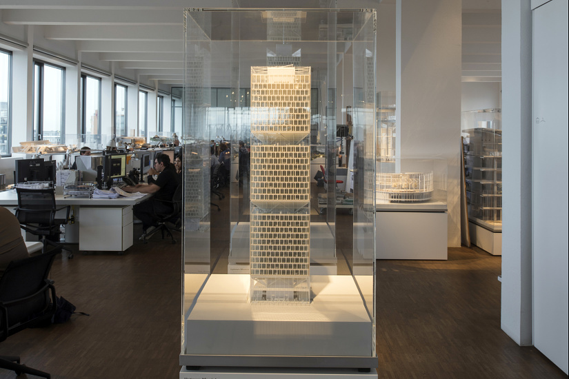 Architectural model of a high-rise building in Ingenhoven Architects' office, lit by ERCO Optec spotlights.