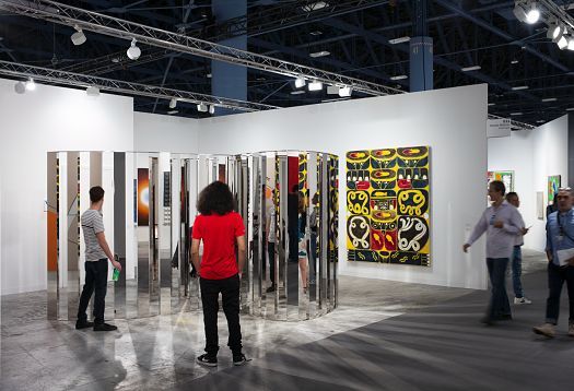 Art Basel Miami Beach illuminated by ERCO LED lighting, showcasing art in galleries.