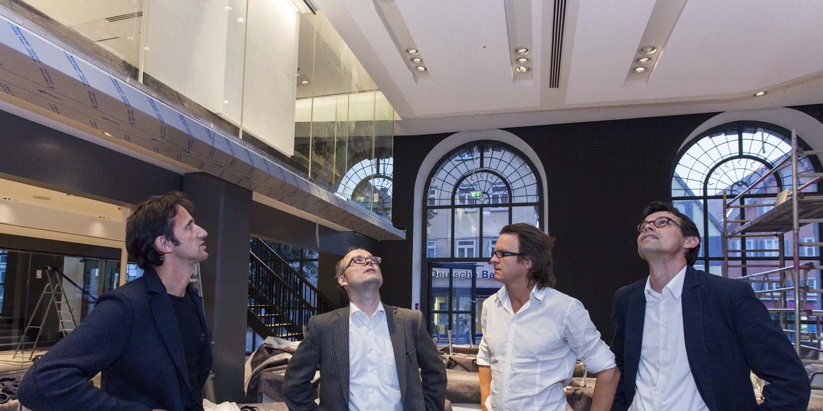 Architects and lighting designers inspect ERCO LED lighting at Schorndorf town hall.