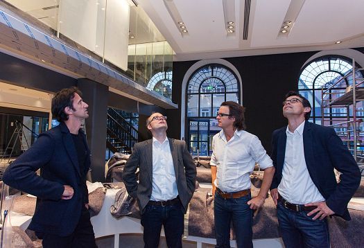 Architects and lighting designers inspect ERCO LED lighting at Schorndorf town hall.