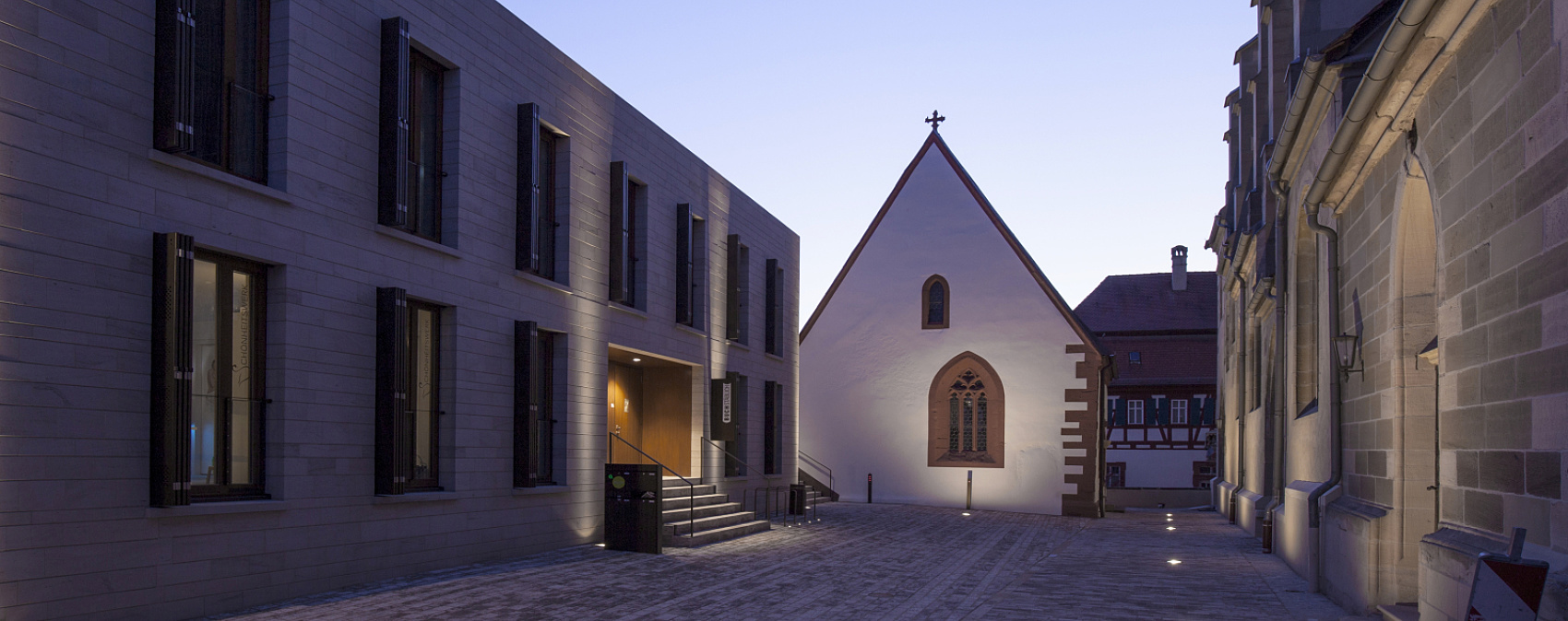 Illuminated buildings in Iphofen, Germany, featuring ERCO LED lighting highlighting architecture.