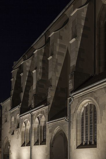 St. Veit parish church in Iphofen, illuminated with ERCO LED lighting, accentuating architecture.