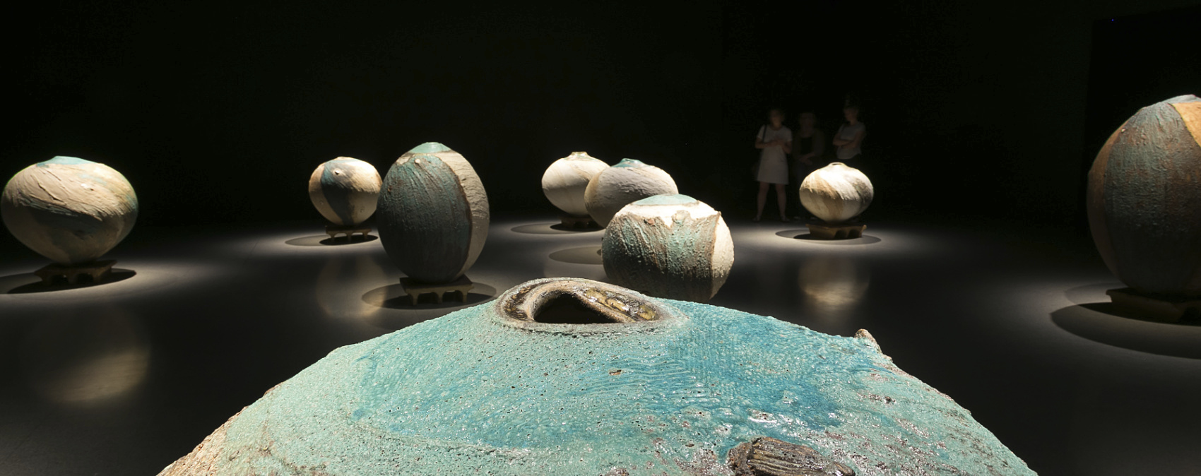 Ceramic artworks by Pippin Drysdale at John Curtin Gallery, lit by ERCO LED spotlights.