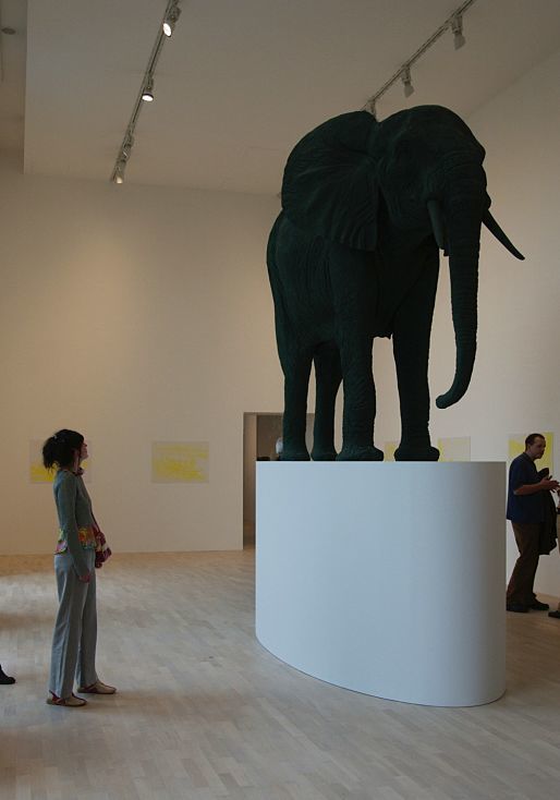 Green elephant sculpture at K21 Art Gallery, illuminated by ERCO spotlights.