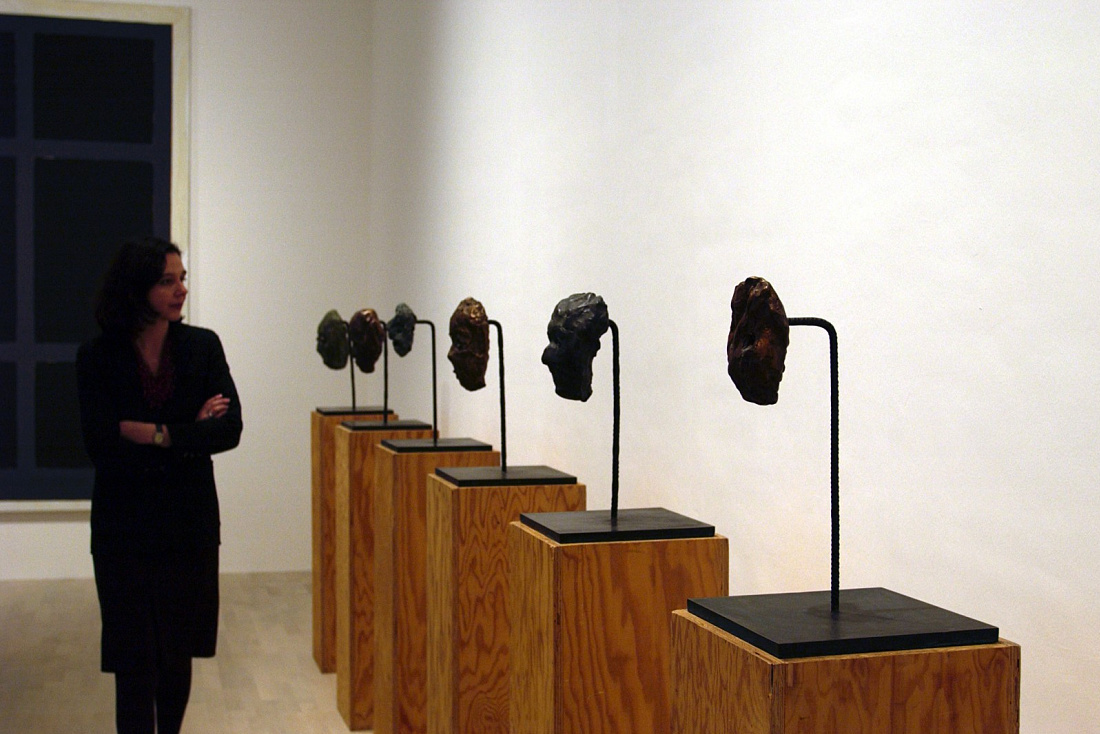 K21 Art Gallery exhibit: Sculptures on pedestals illuminated by ERCO spotlights, part of the North Rhine-Westphalia art collection.