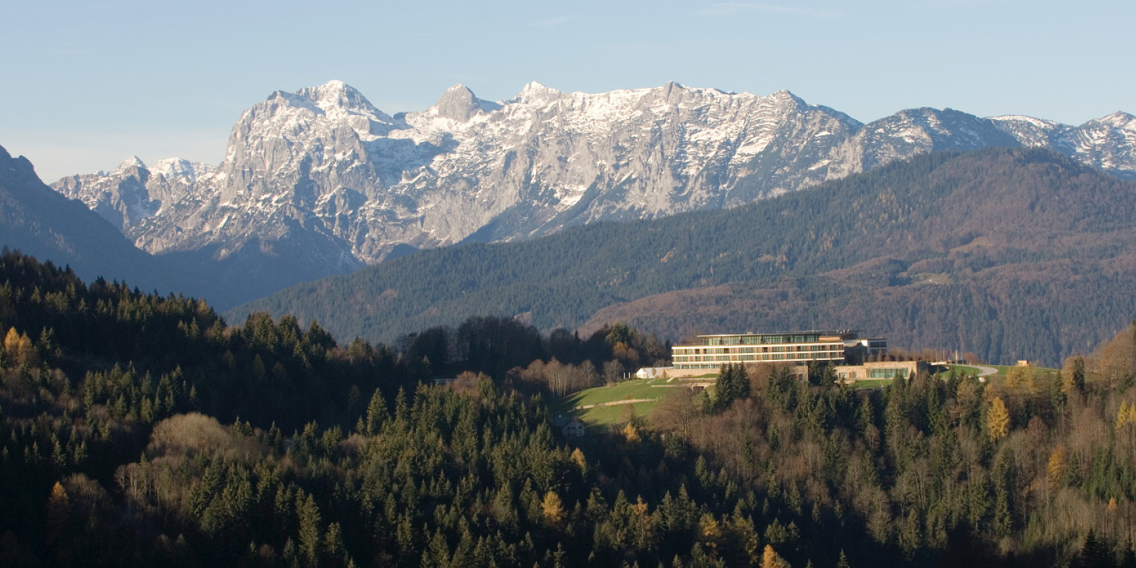 Kempinski Hotel Berchtesgaden with ERCO LED lighting, set against the Alps.
