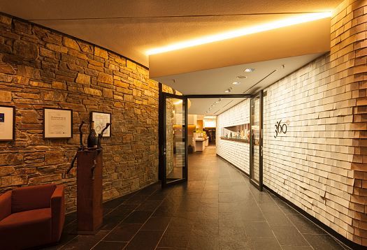 ERCO LED lighting in Johann Grill Restaurant, Kempinski Hotel Berchtesgaden, creating an inviting atmosphere.