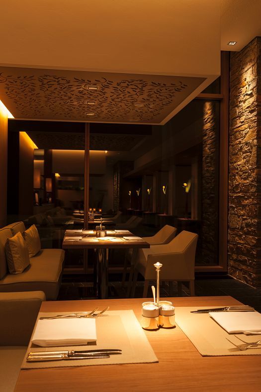 Johann Grill Restaurant at Kempinski Hotel Berchtesgaden, featuring ERCO LED lighting for ambiance.