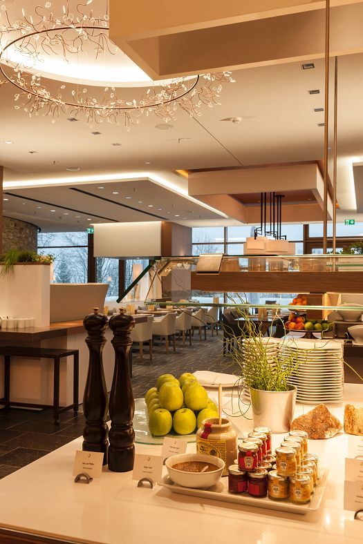 Johann Grill Restaurant at Kempinski Hotel featuring ERCO LED lighting for ambiance.
