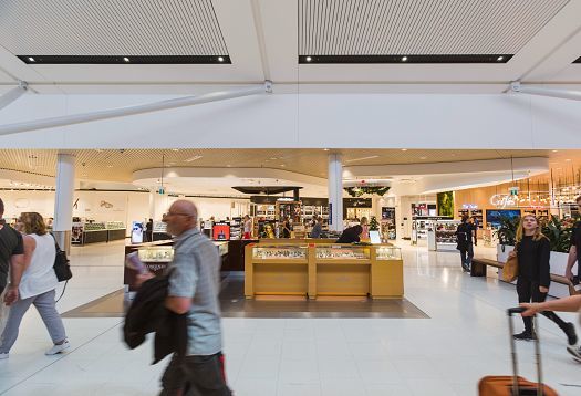ERCO Skim downlights provide efficient ambient lighting in Sydney Airports Terminal 1.