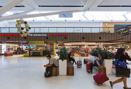 Sydney Airport Terminal 1 illuminated by efficient ERCO Skim downlights.