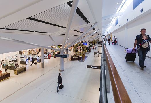 Sydney Airports Terminal 1 illuminated by efficient ERCO Skim downlights.