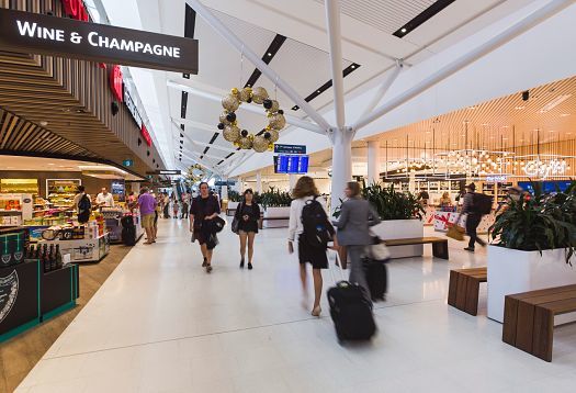 Sydney Airport Terminal 1 illuminated by efficient ERCO Skim downlights.
