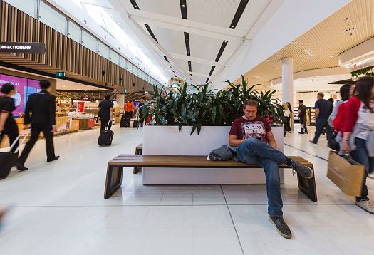 Sydney Airport Terminal 1 illuminated by efficient ERCO Skim downlights.