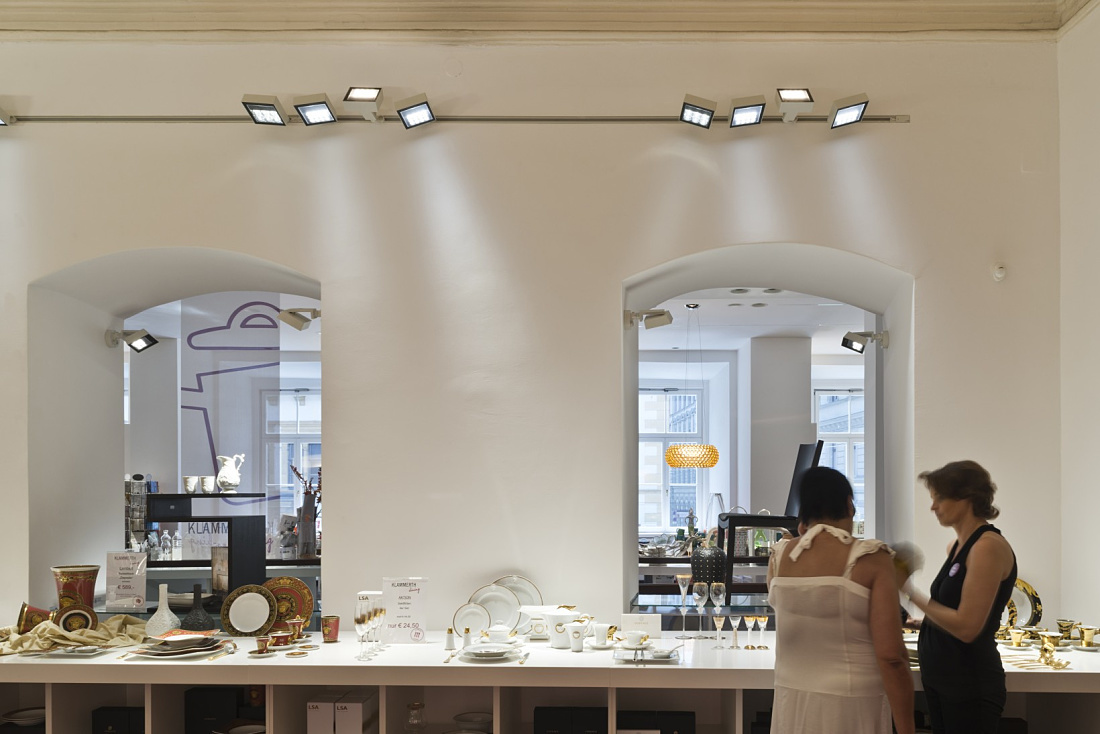 Klammerth store in Graz with LED spotlights illuminating tableware and table culture.