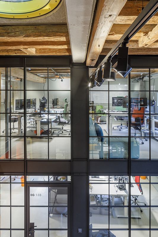 Koppenmühle office in Darmstadt featuring ERCO Jilly downlights and Parscan spotlights.