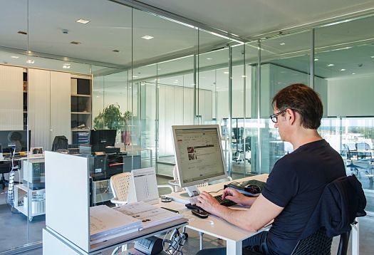 ERCO LED lighting in Le Silla headquarters office, providing efficient workplace illumination.
