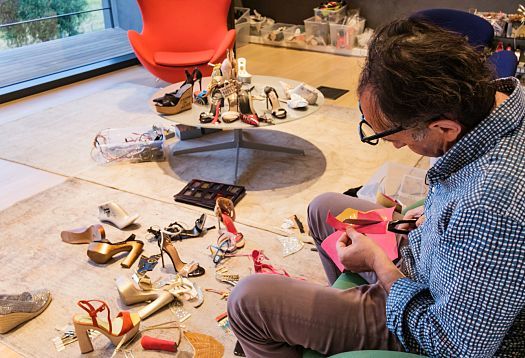 Enio Silla designing exclusive Le Silla footwear in the design studio.