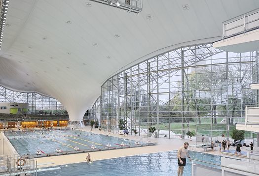 Aquatic Center, Olympic Park, Munich, featuring ERCO LED lighting for energy efficiency and visual comfort.
