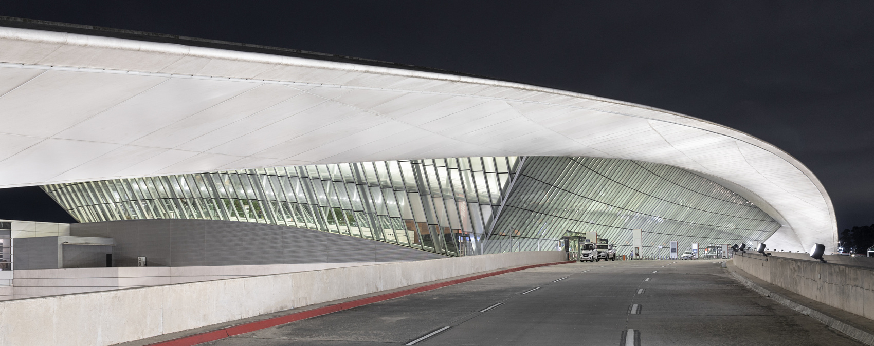Carrasco International Airport illuminated at night with ERCO LED lighting for energy efficiency.
