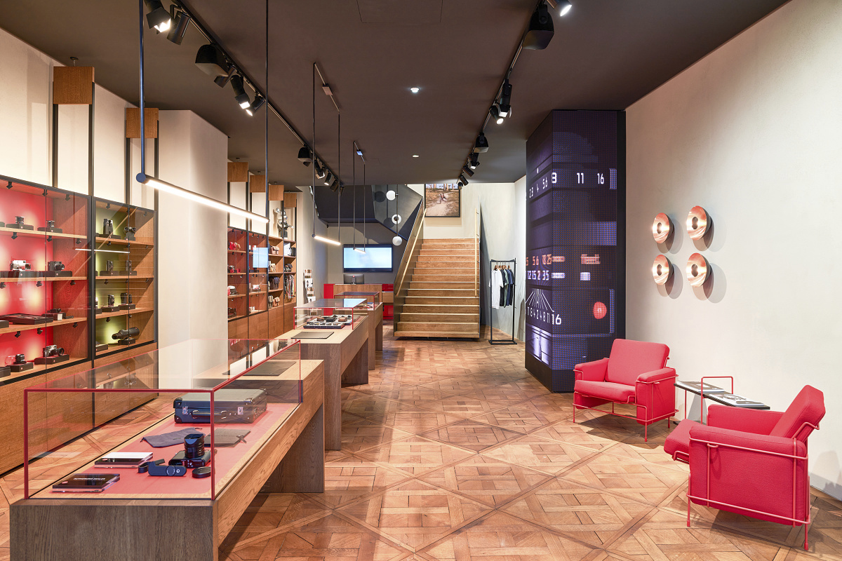 Leica Store Vienna featuring ERCO LED lighting: Eclipse spotlights and light structures for gallery and general illumination.