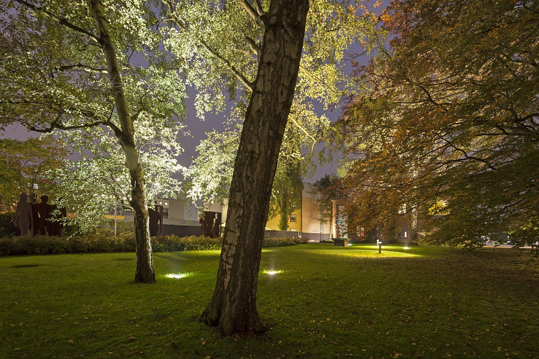 Levy Gallerys illuminated sculpture garden featuring ERCO lighting for art and nature.