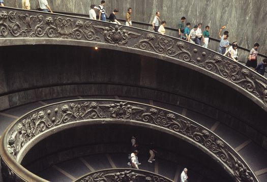 Spiral staircase in the Vatican, illuminated with ERCO lighting.