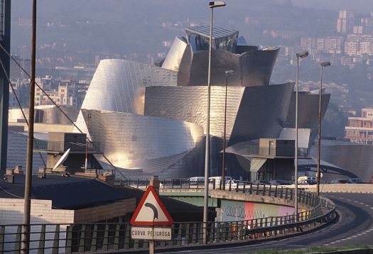 The Guggenheim Museum Bilbao, showcasing innovative architecture, illuminated by ERCO lighting.
