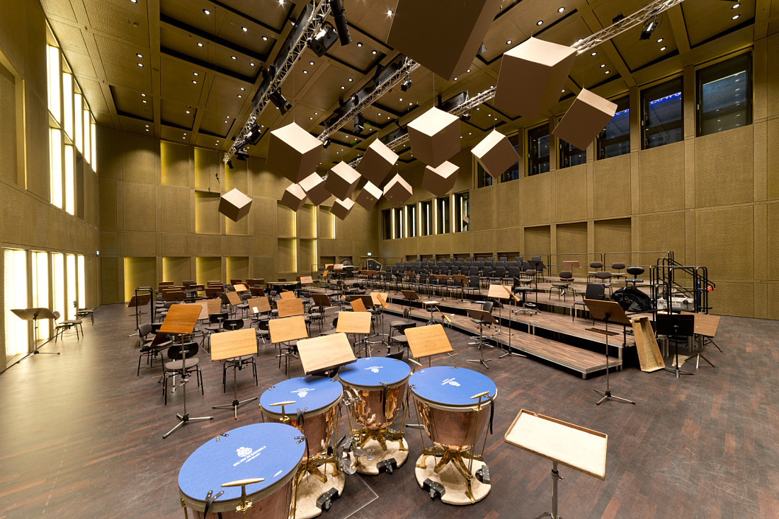 Linz Music Theater interior featuring percussion instruments and ERCO lighting.