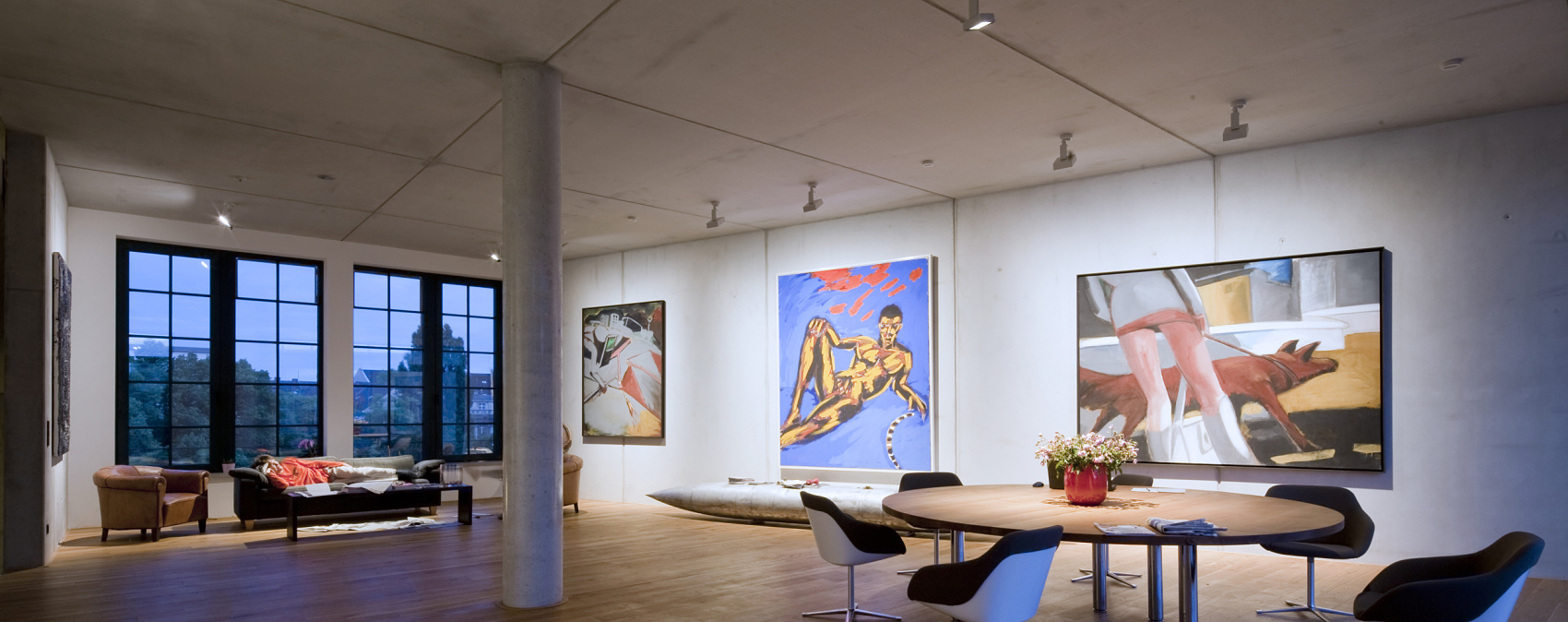 ERCO accent lighting in a residential space featuring artwork and minimalist design.