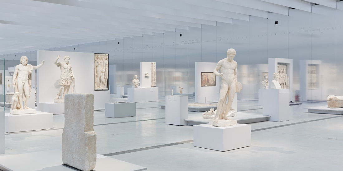 Louvre Lens Museum gallery featuring illuminated sculptures with ERCO LED lighting.