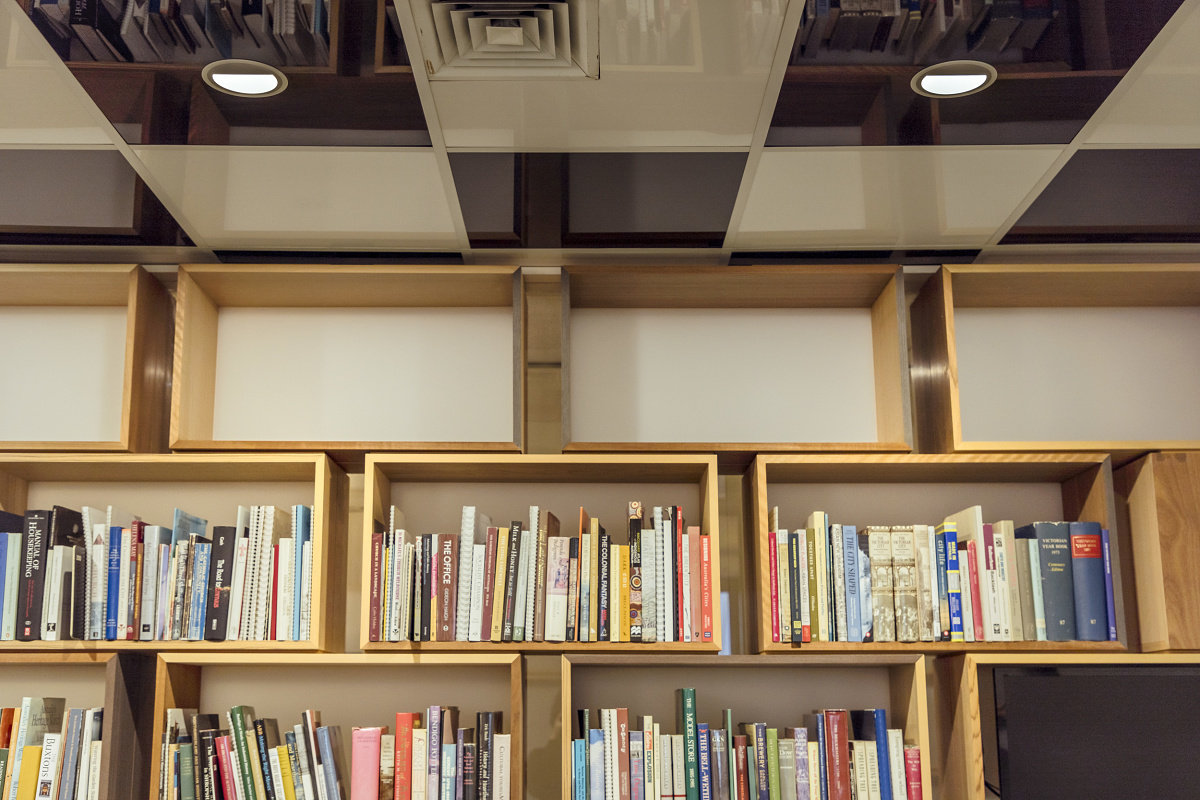 ERCO Iku downlights illuminate bookshelves at Lovell Chen's Melbourne office.