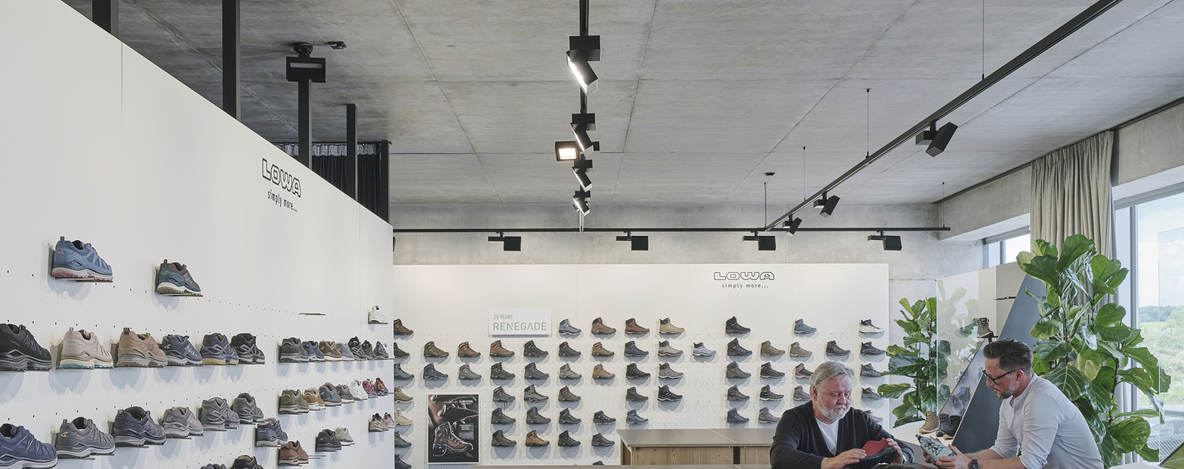 Lowa office and showroom featuring ERCO LED lighting, providing flexible, perception-oriented office illumination.