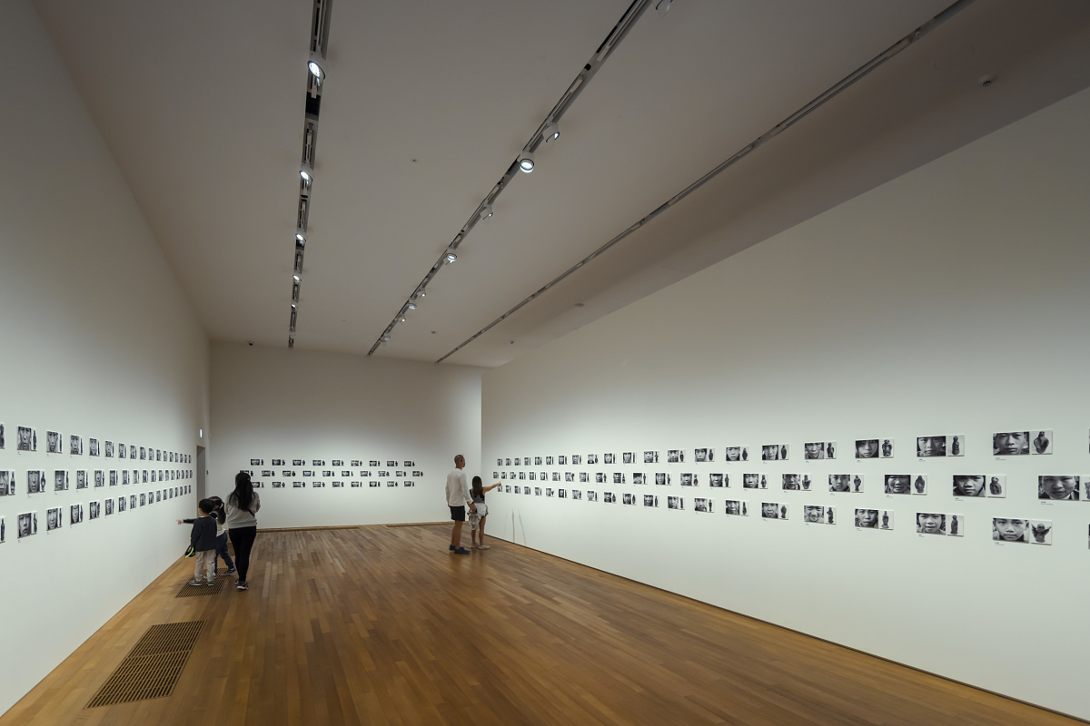 Visitors view art illuminated by ERCO spotlights in the M+ Museum, Hong Kong.
