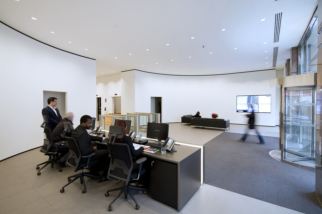 Mace HQ London foyer illuminated by Quintessence LED wallwashers, creating a prestigious entrance.