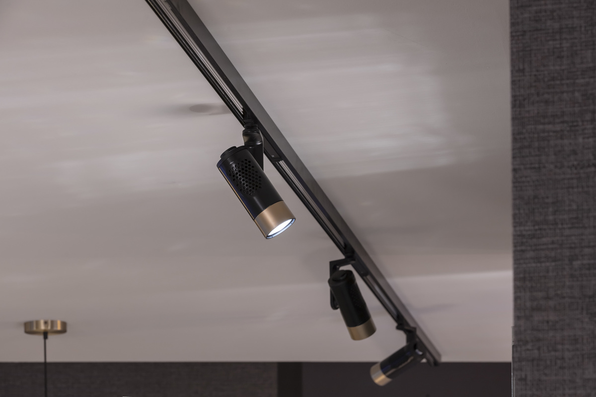 ERCO Eclipse spotlights on a track, providing precise accent lighting in a studio.