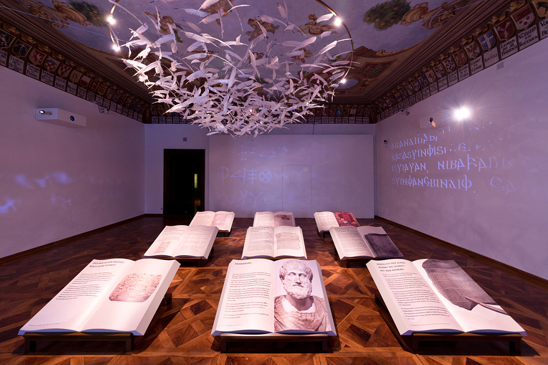 MAMUZ Museum exhibit featuring interactive displays and ERCO lighting.