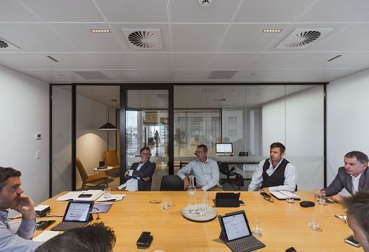 Conference room featuring ERCO lighting for visual comfort and minimalist design in Sydney.
