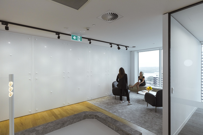 ERCO Compar linear luminaires in a modern Sydney office, minimalist design for high visual comfort.