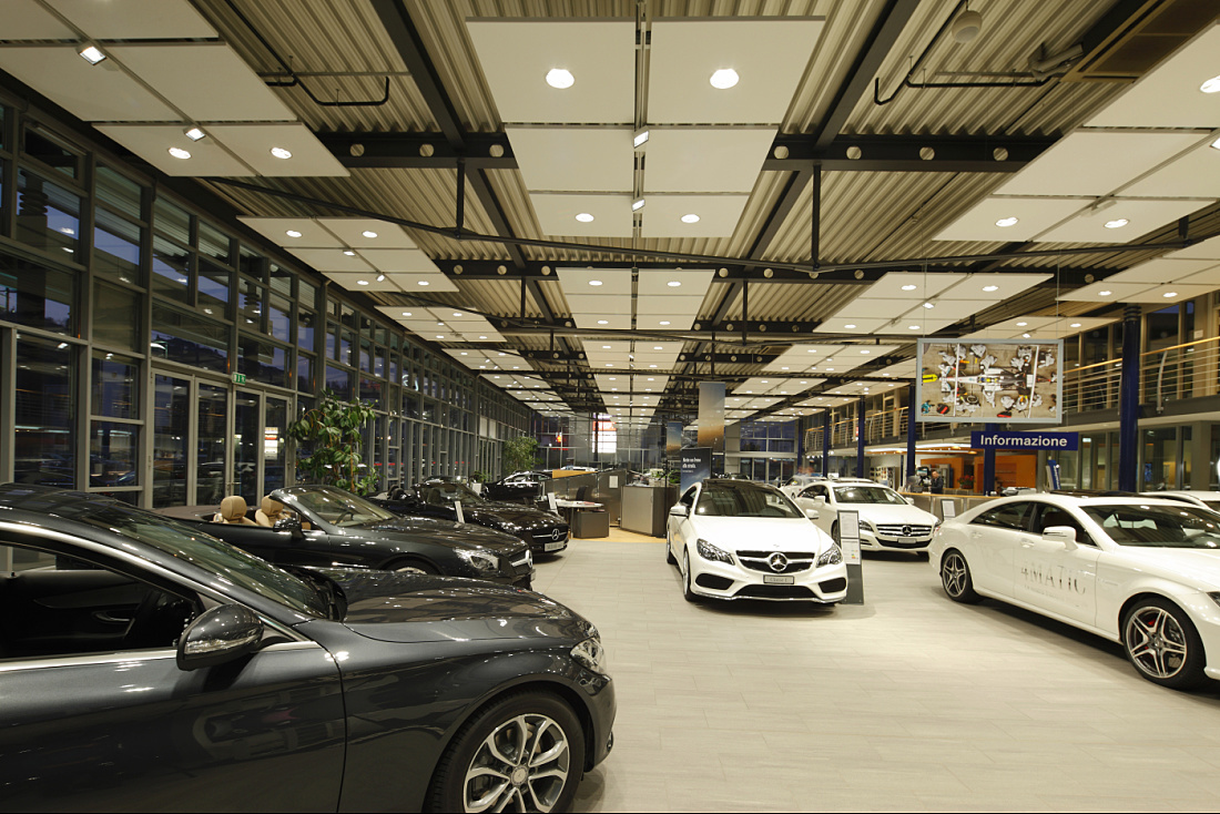 Mercedes showroom in Lugano, featuring ERCO LED lighting for car presentation.