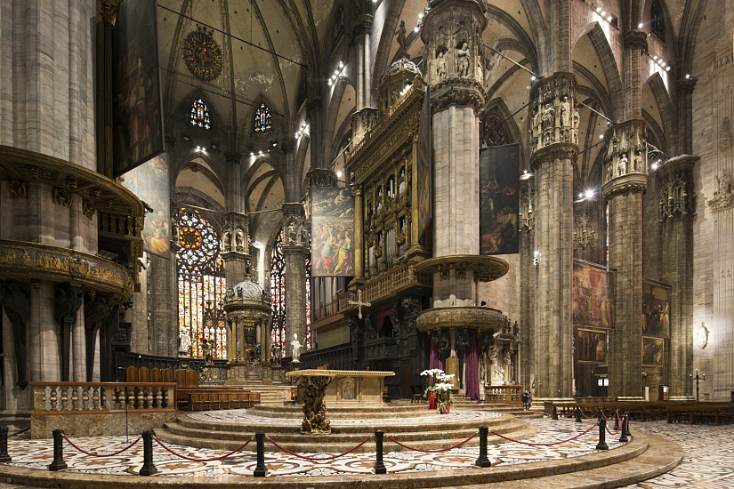 Interior of Milan Cathedral featuring ERCO LED lighting, highlighting details.
